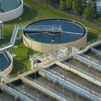 aerial_view_modern_water_cleaning_facility_urban_wastewater_treatment